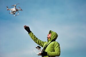 man-operating-a-drone-PZ5DBAV.jpg